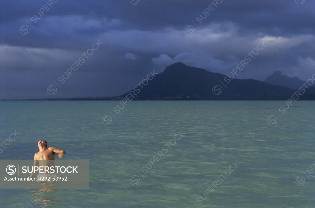 Mauritius Island, man in shallow water