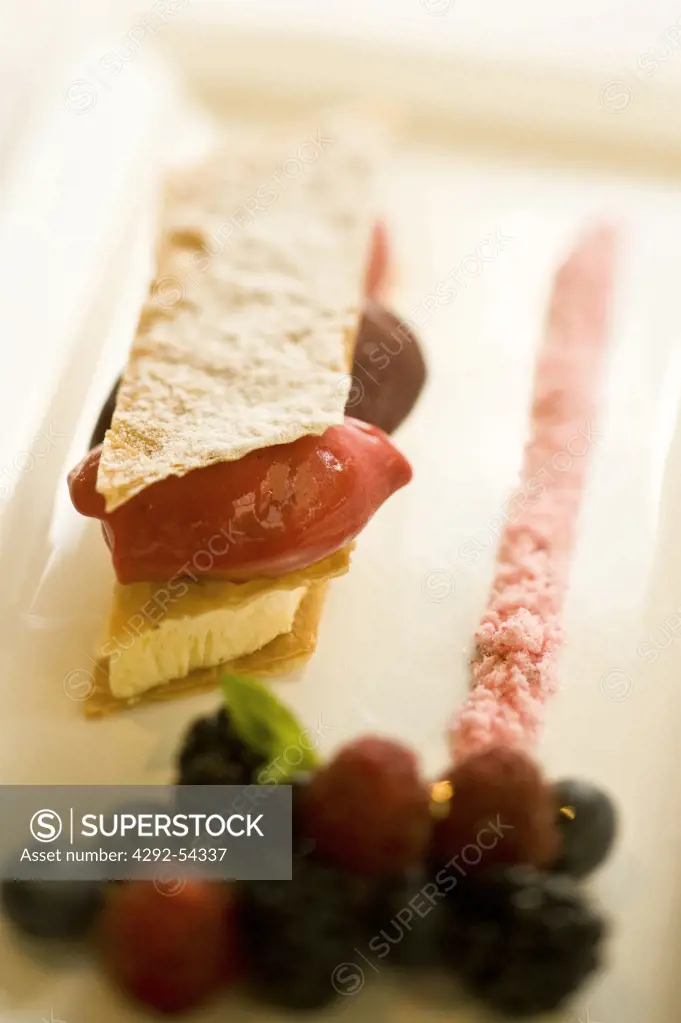 Millefeuille of Champagne semifreddo, berry sorbets with fresh berries