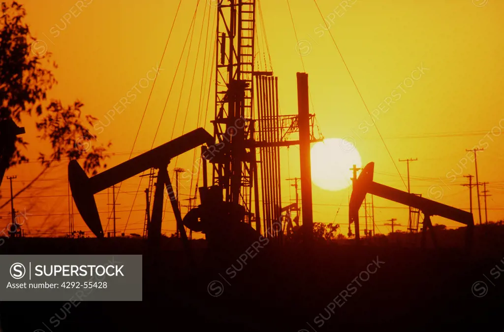 Usa California,silhouette of oil pumps