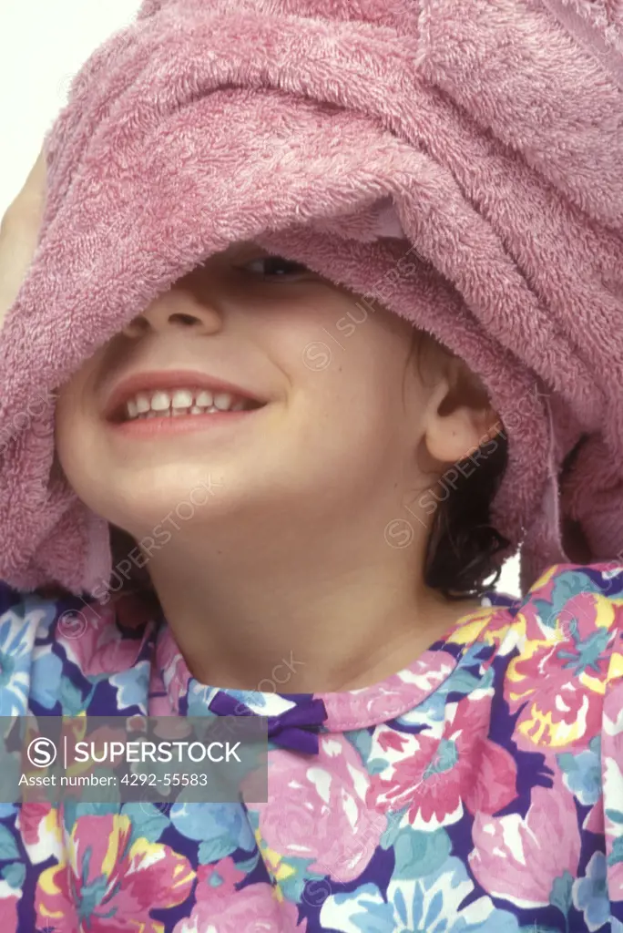 Girl with a towel on her head