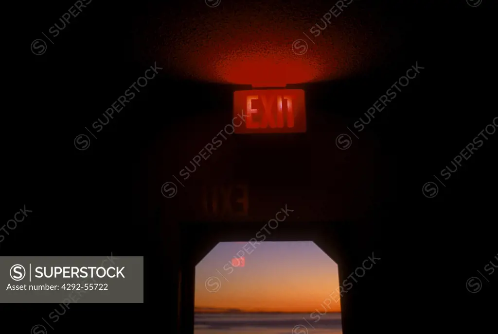 Exit Sign, Door and Dawn Sky