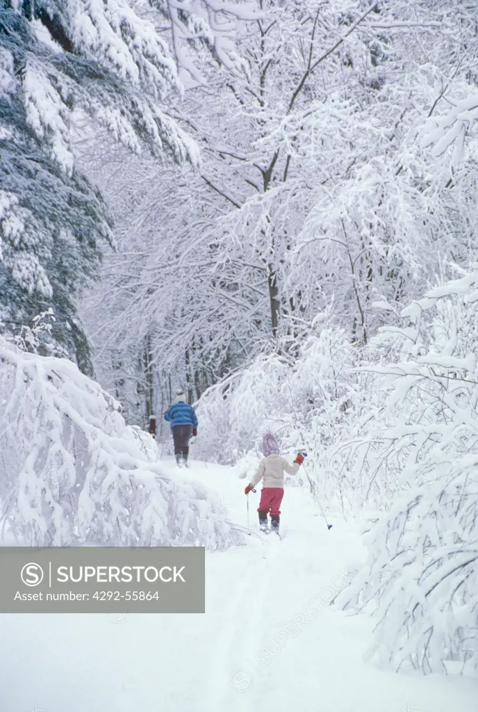 Mother and daughter cross country skiing in Jefferson, Maine