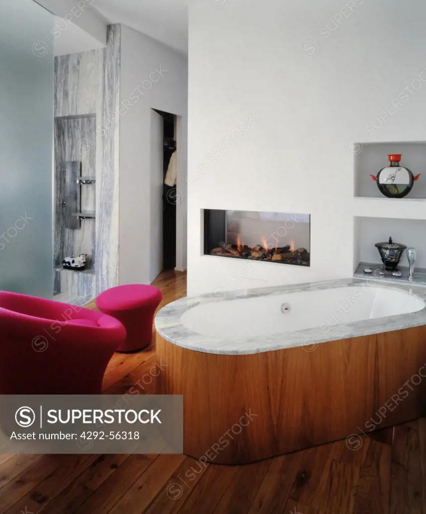 Interior of modern bathroom with bathtub