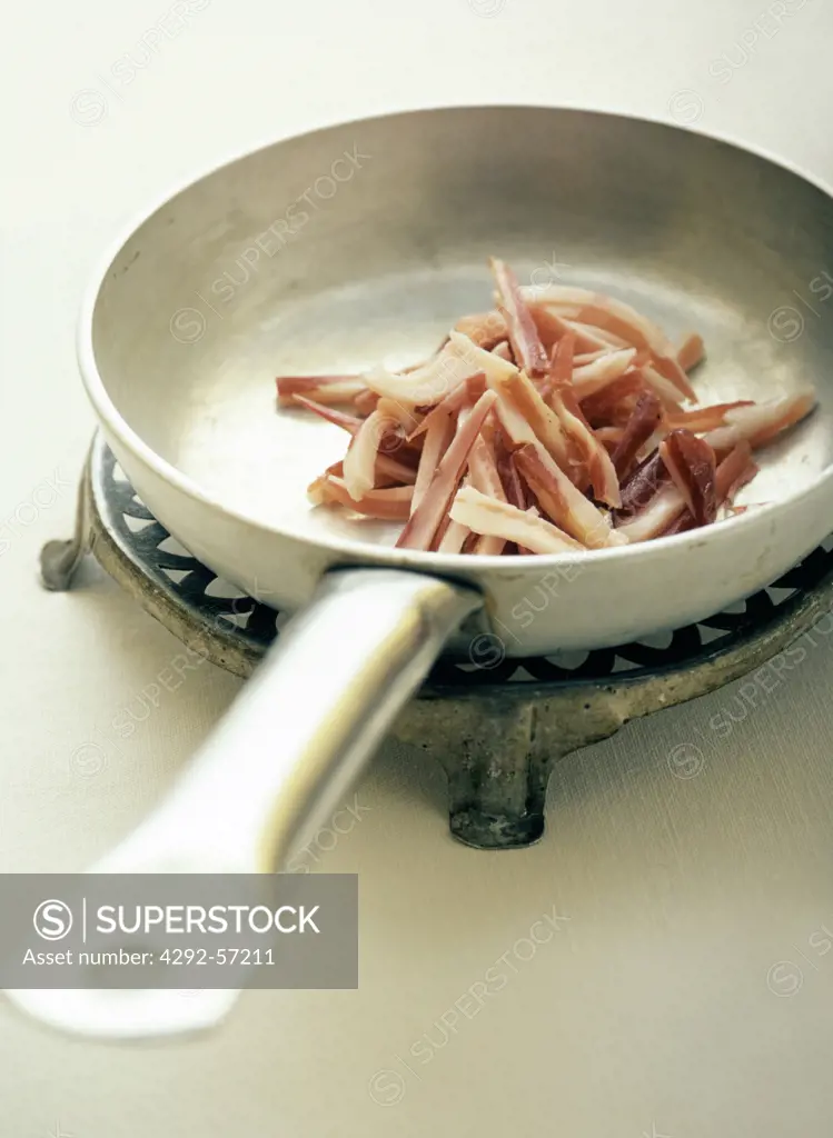Bacon stripes in a pan