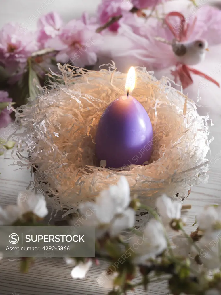 Nest with easter egg candle