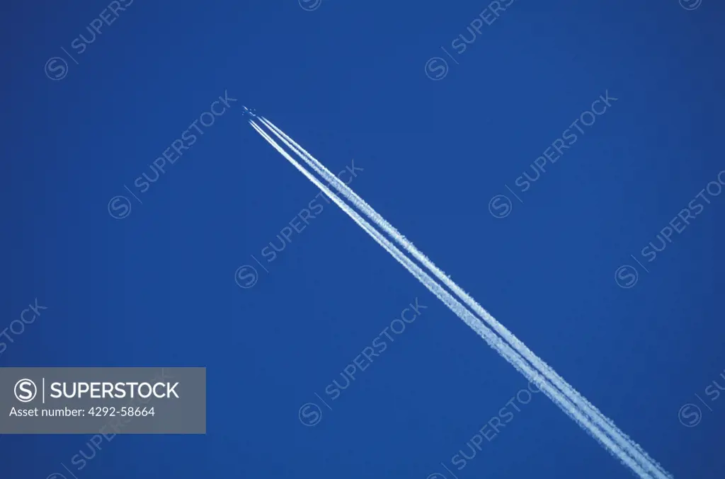 Jet contrails in the blue sky