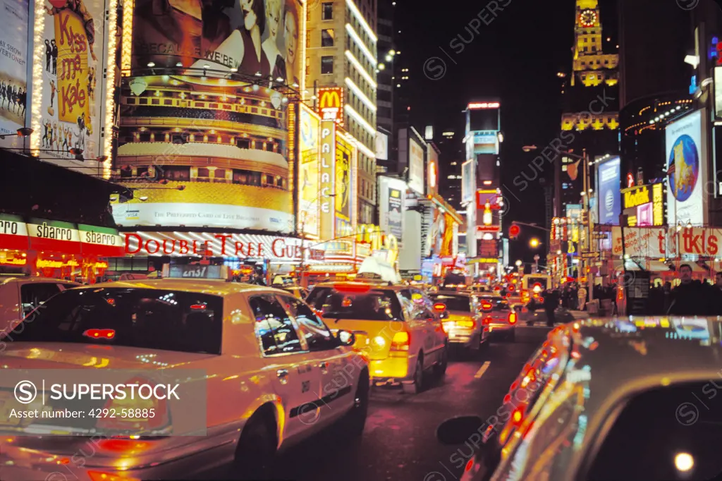 USA, New York, New York City, Taxi Cabs in Times Square at night