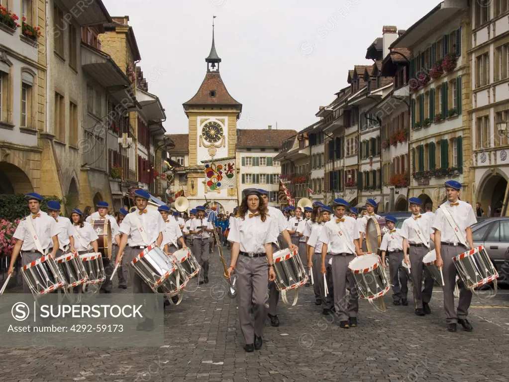 Switzerland, Fribourg Canton, Murten. Historic city gate.Band parade