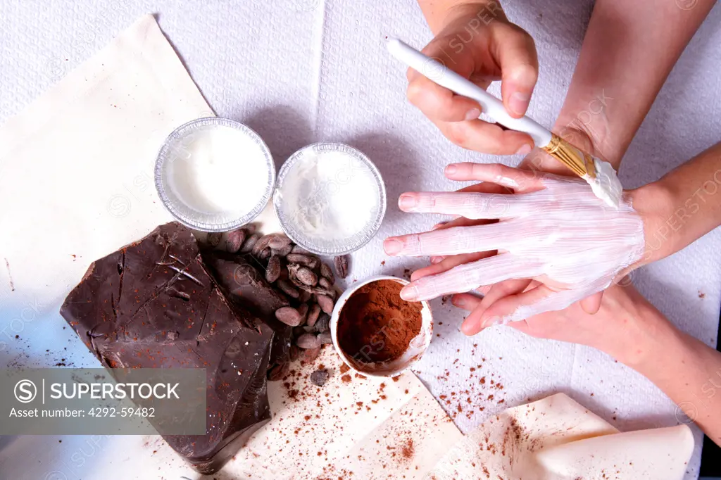 Chocolate therapy, close up of woman's hands