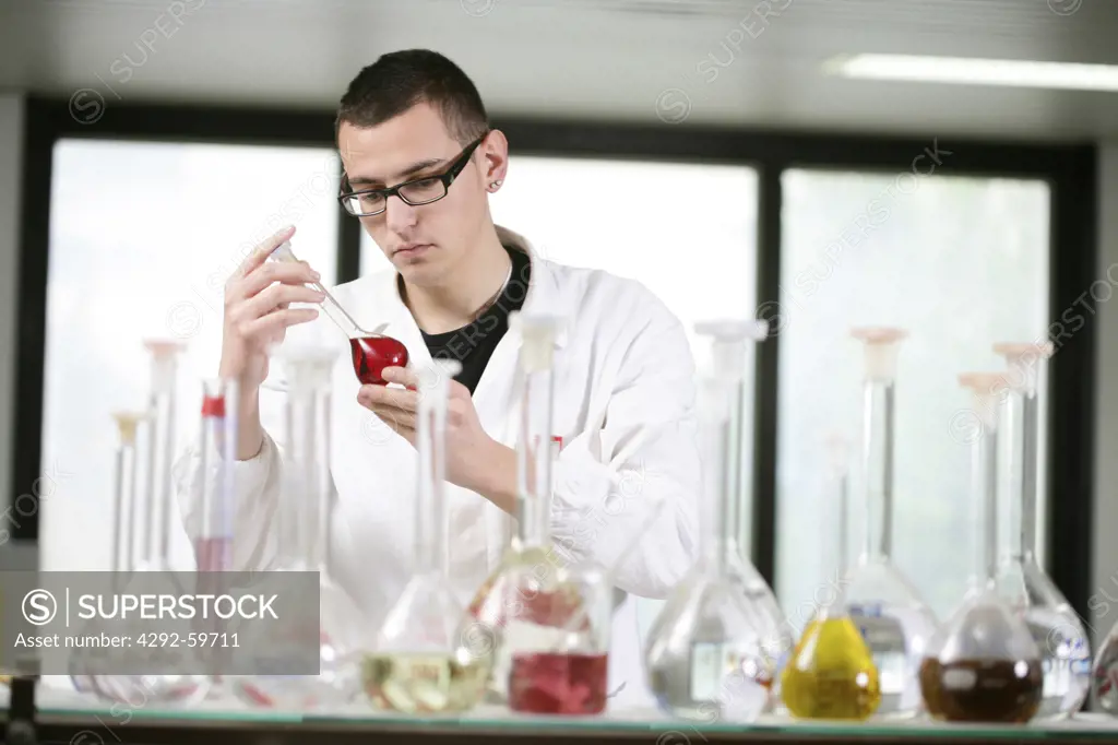 Worker in chemistry laboratory
