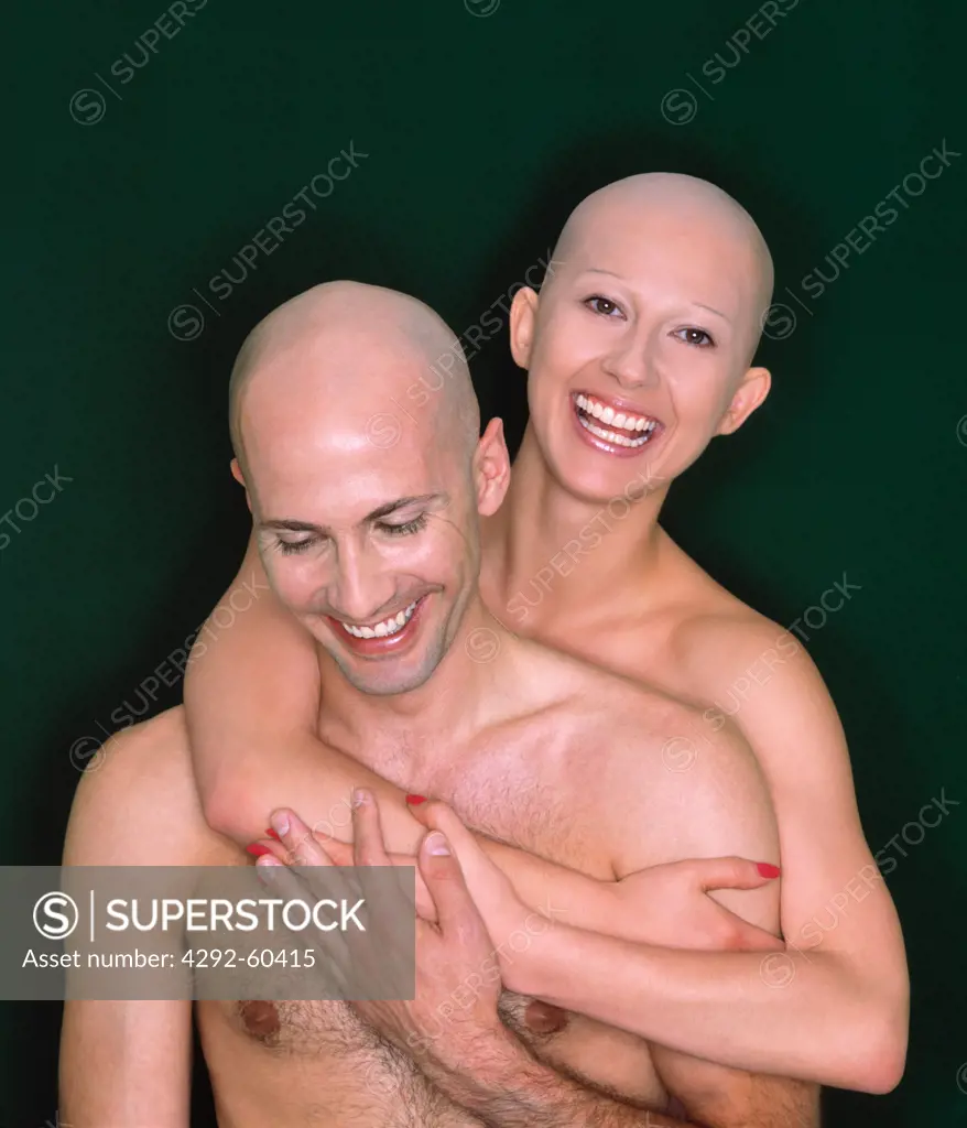 Couple with shaved heads