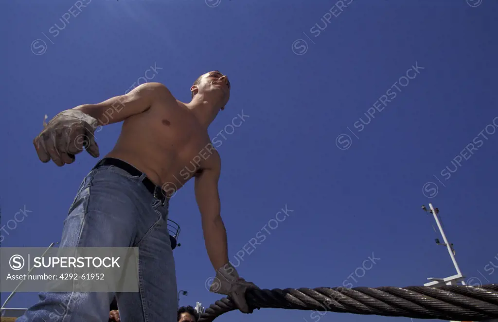 Man working on platform at sea
