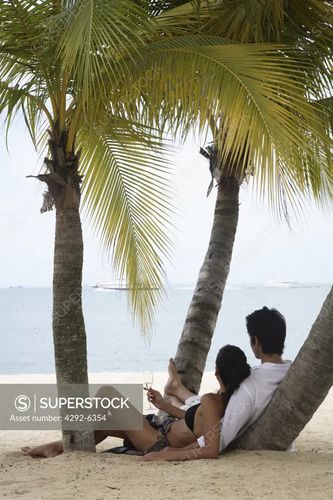 Couple at Tanjong Beach at Sentosa in Singapore