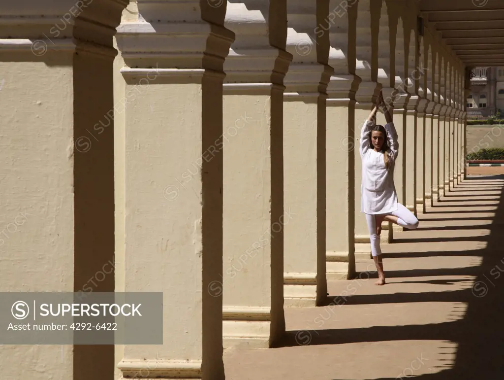 Yoga inside the corridor at Mysore Palace, Mysore, India