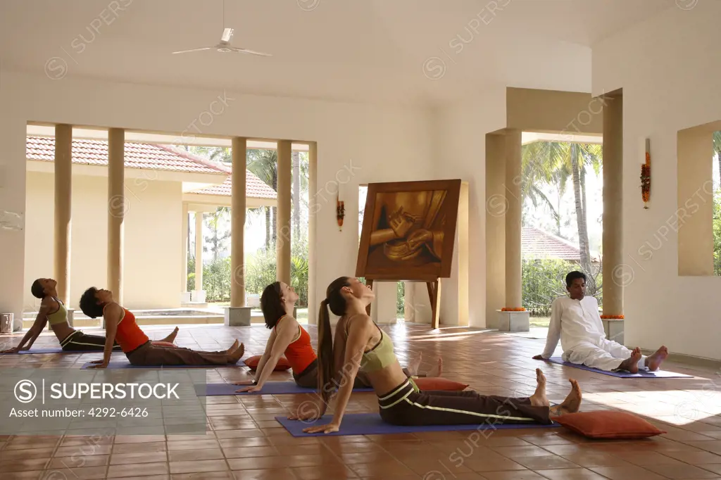 Group Yoga Session inside the Yoga Pavilion at Shreyas Retreatnear Bangalore, India