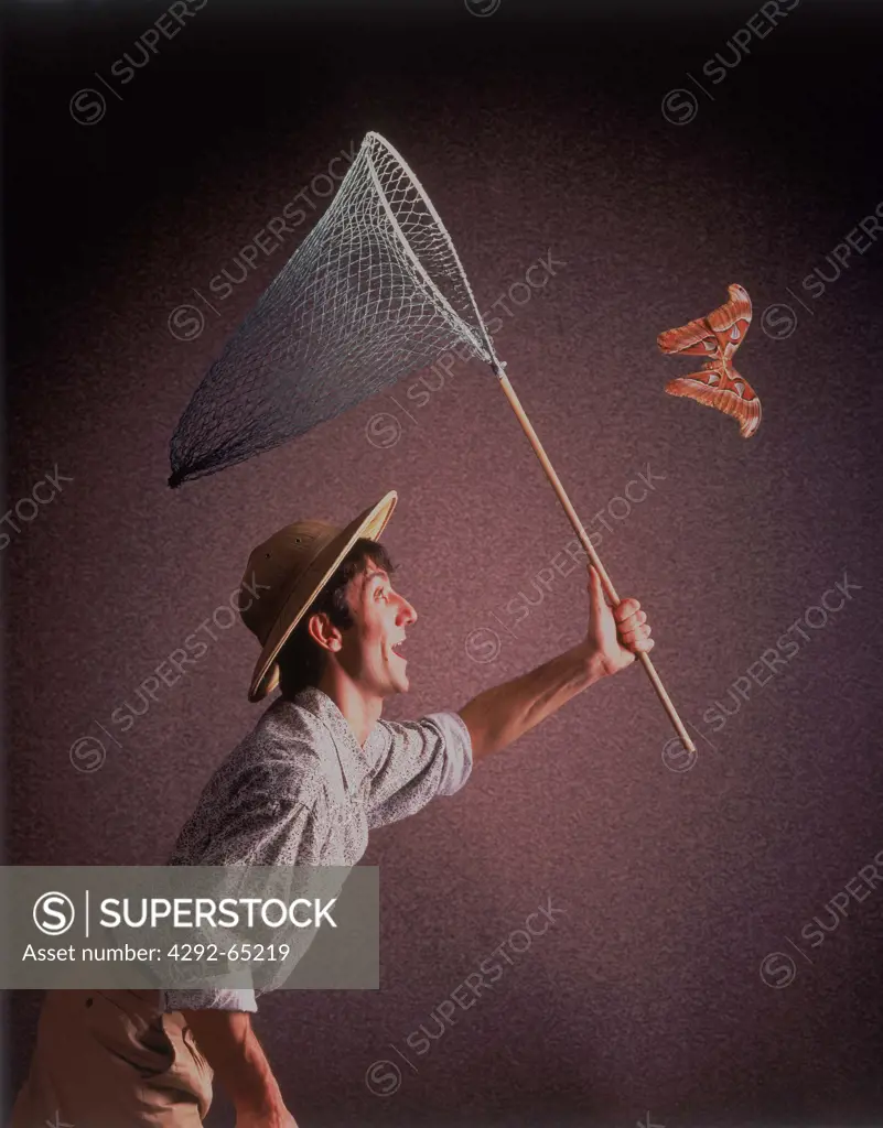 Man hunting butterfly