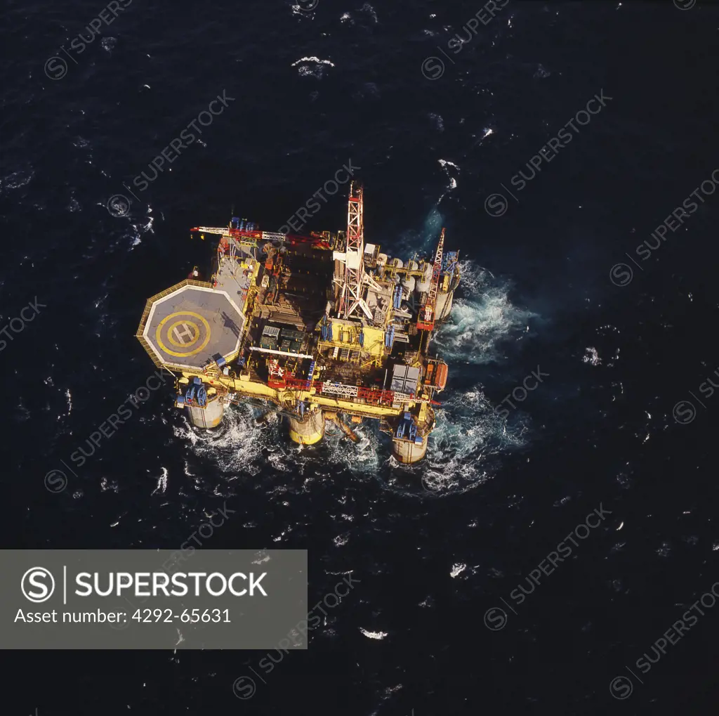 Semi submersible oil exploration drilling rig working in the North Sea, aerial