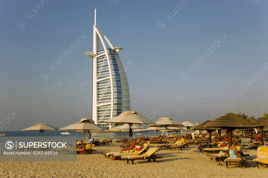United Arab Emirates, Dubai, View over beach outside Al Qasr Hotel of Burj al Arab Hotel, stands on an island off Jumeirah Beach.