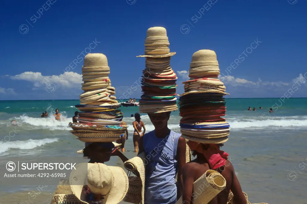 Hat salesmen in the beach of Boa Viagem, Recife, Pernambuco, Brazil