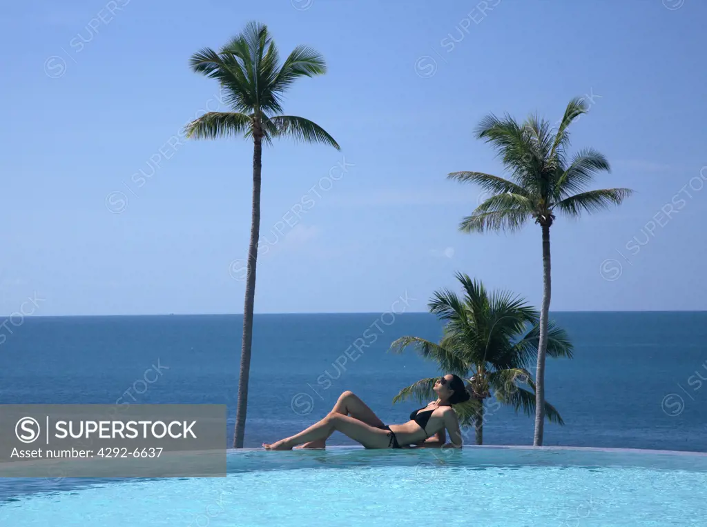 Girl at the pool at Sasha Resort in Koh Samui, Thailand