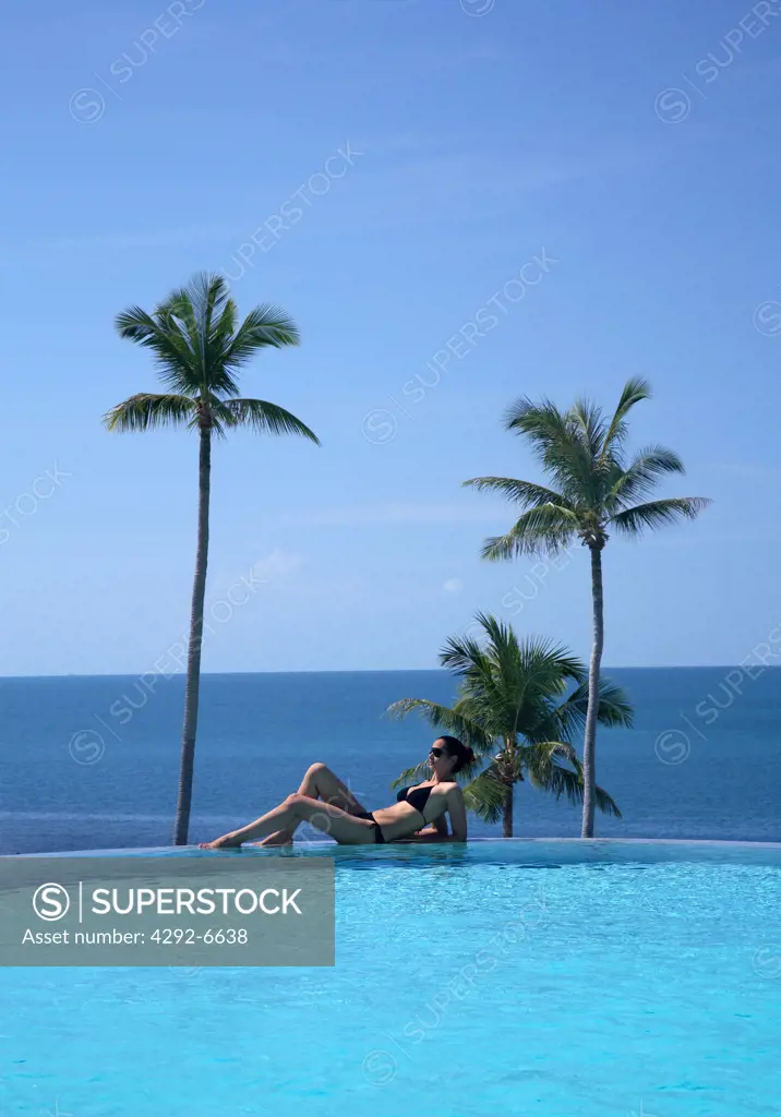 Girl at the pool at Sasha Resort in Koh Samui, Thailand