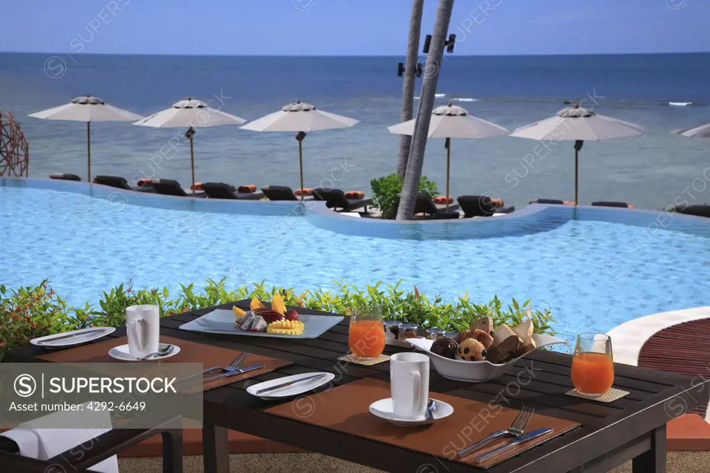 Table by the pool at Sasha Resort in Koh Samui, Thailand