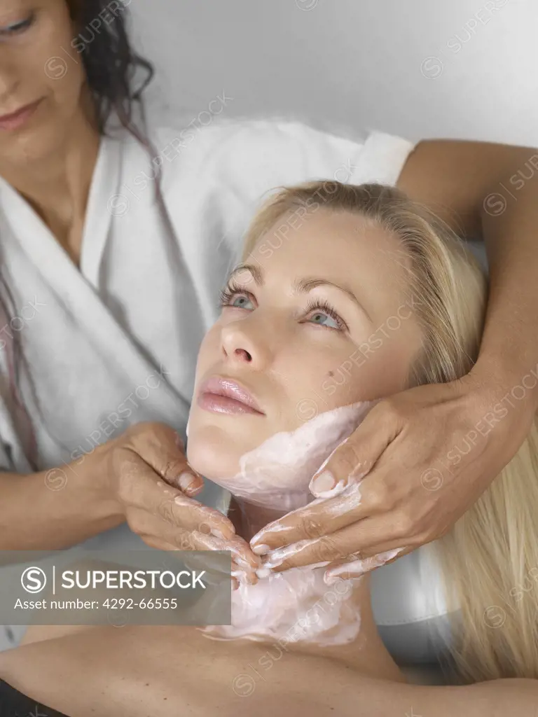 Woman getting yogurt face mask