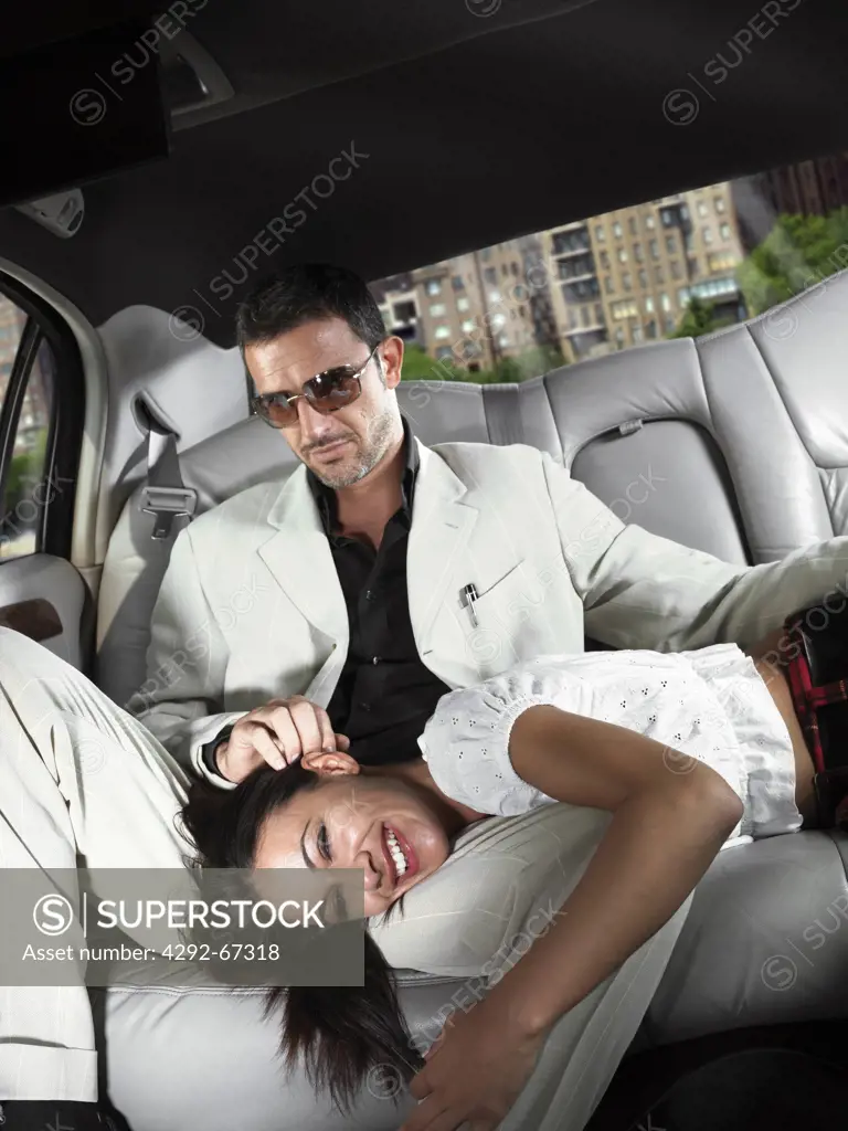 Couple in limousine