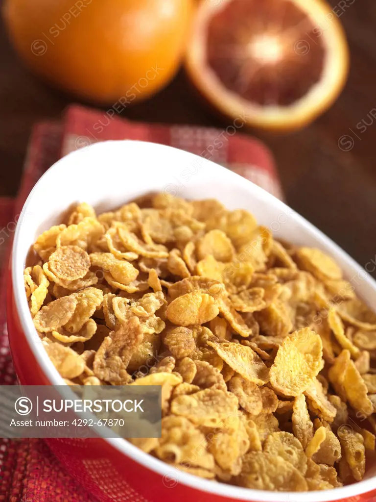 Bowl of cereals and oranges