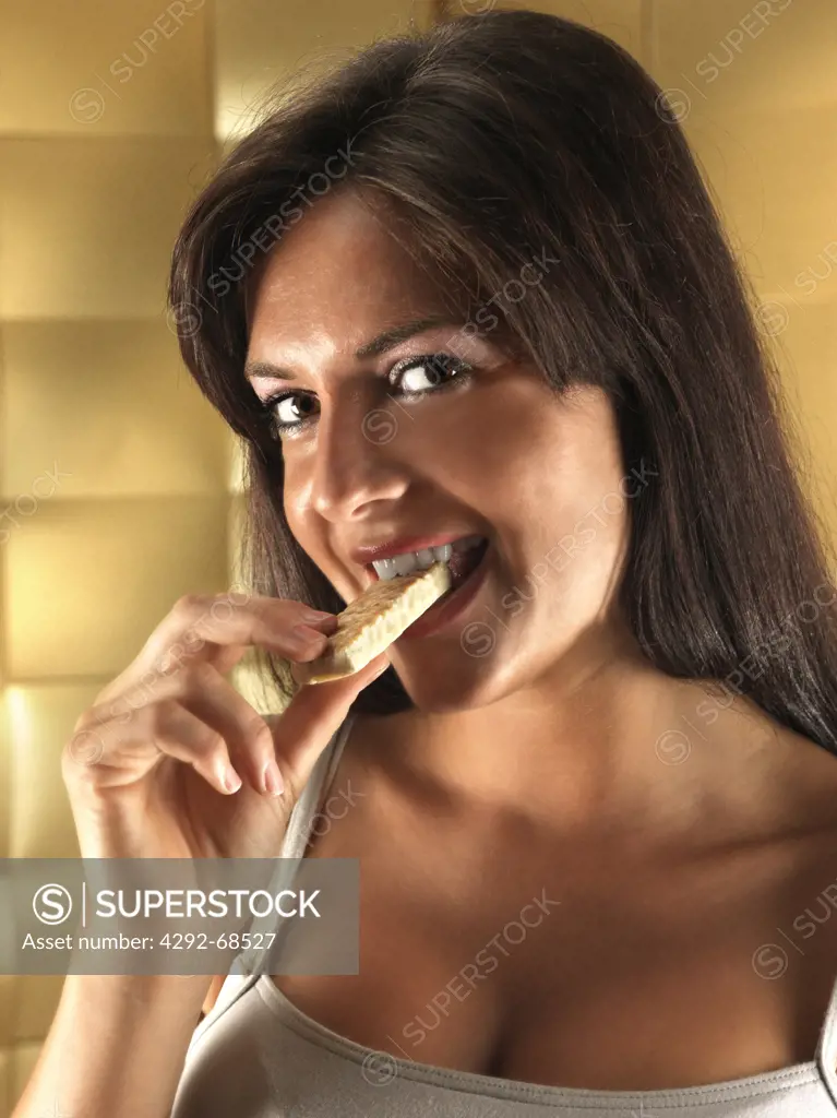 A woman with a bar of chocolate