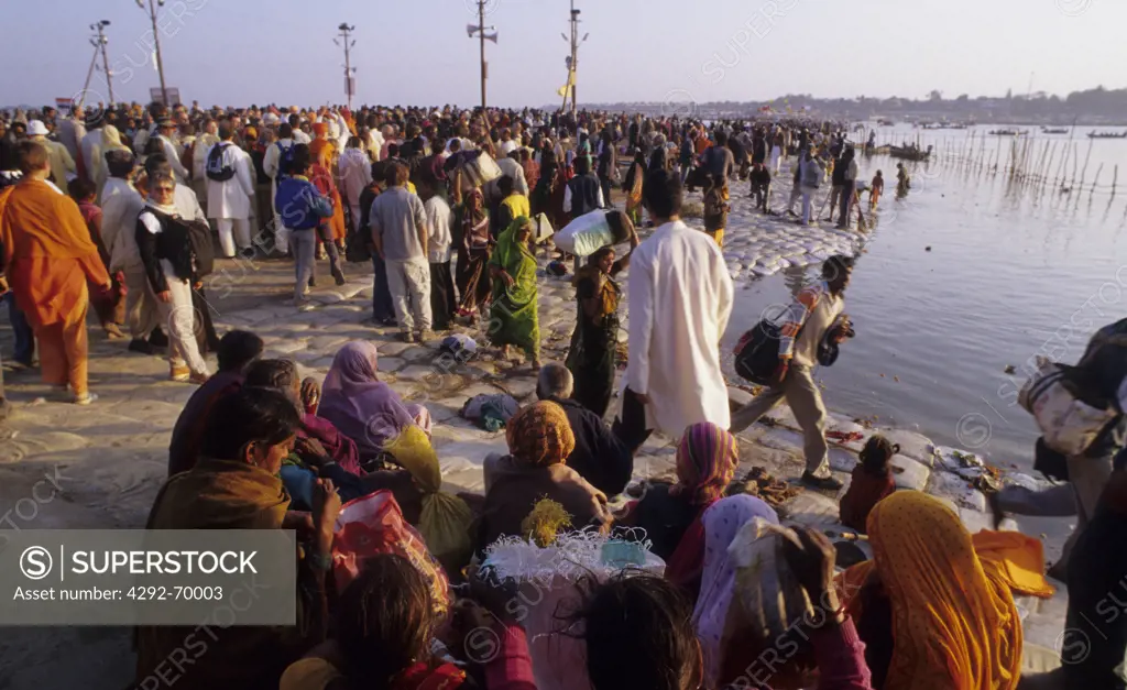 India,Uttar Pradesh, Allahabad (Prayag),Kumbh Mela holy Festival. People standing by Sangam river