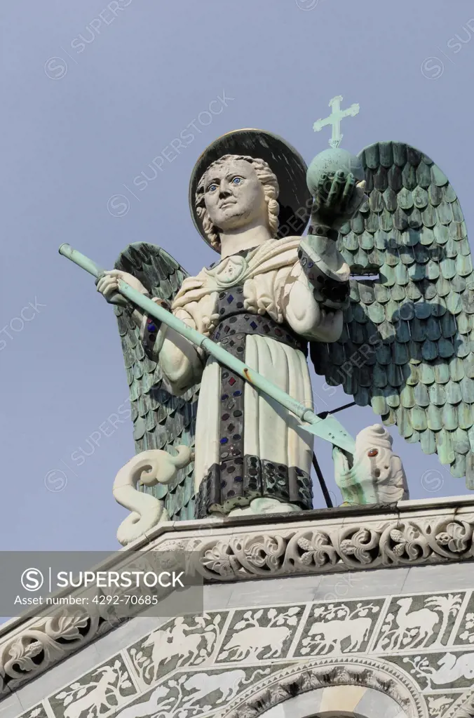Italy, Tuscany, Lucca, St.Michael in Foro church, romanesque style, Saint Michael arcangel statue