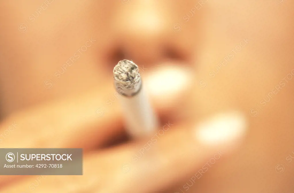 Woman smoking, close up