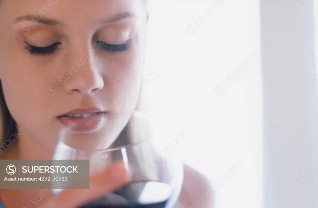 Woman with a glass of wine