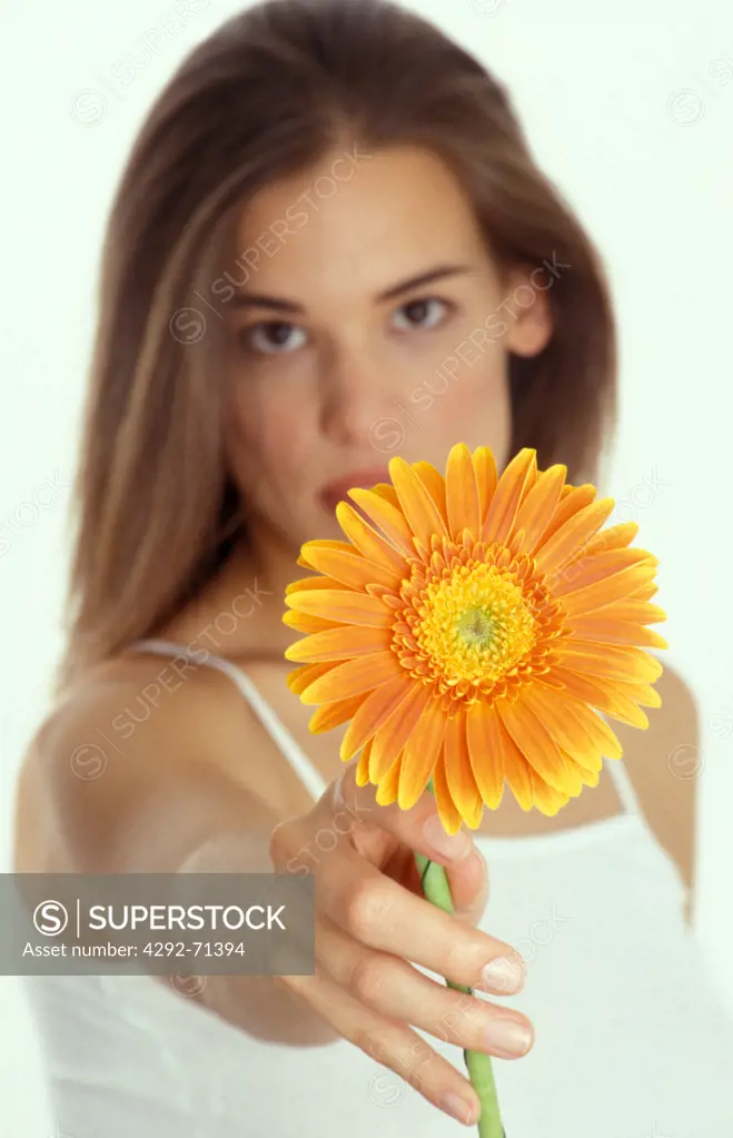 Woman holding a flower