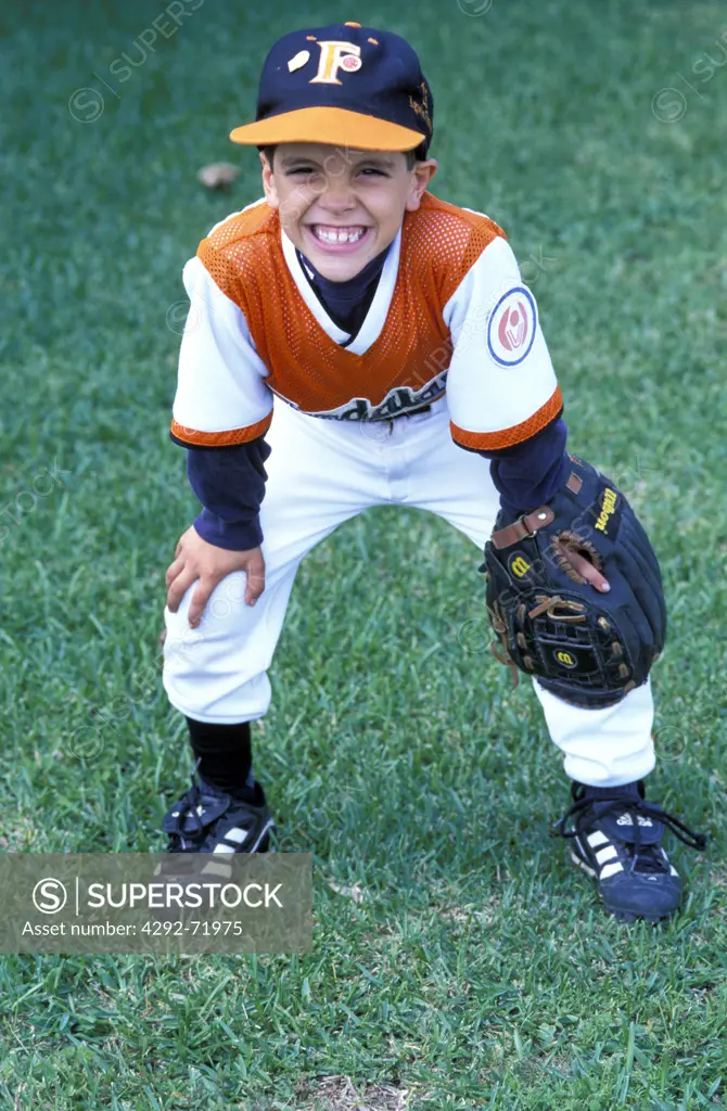 Portrait of boy playing baseball