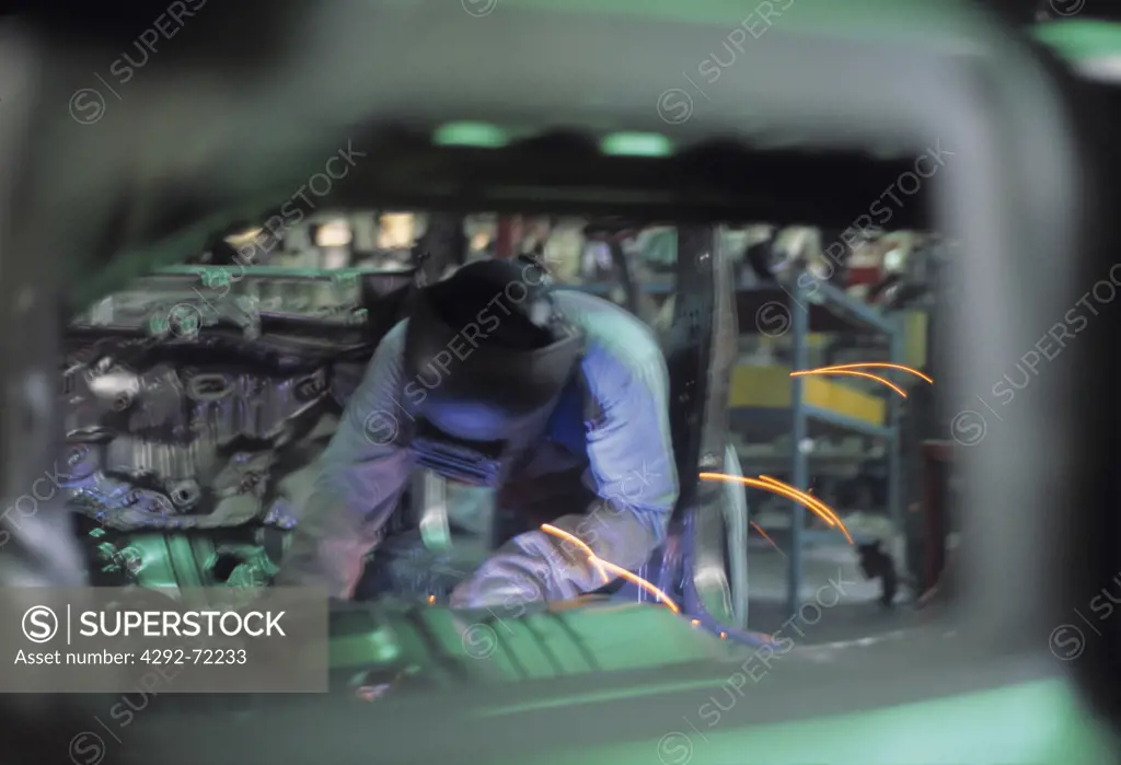 Welder in car factory