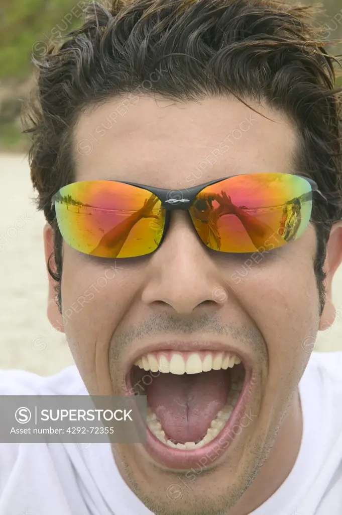 Man with sunglasses screaming