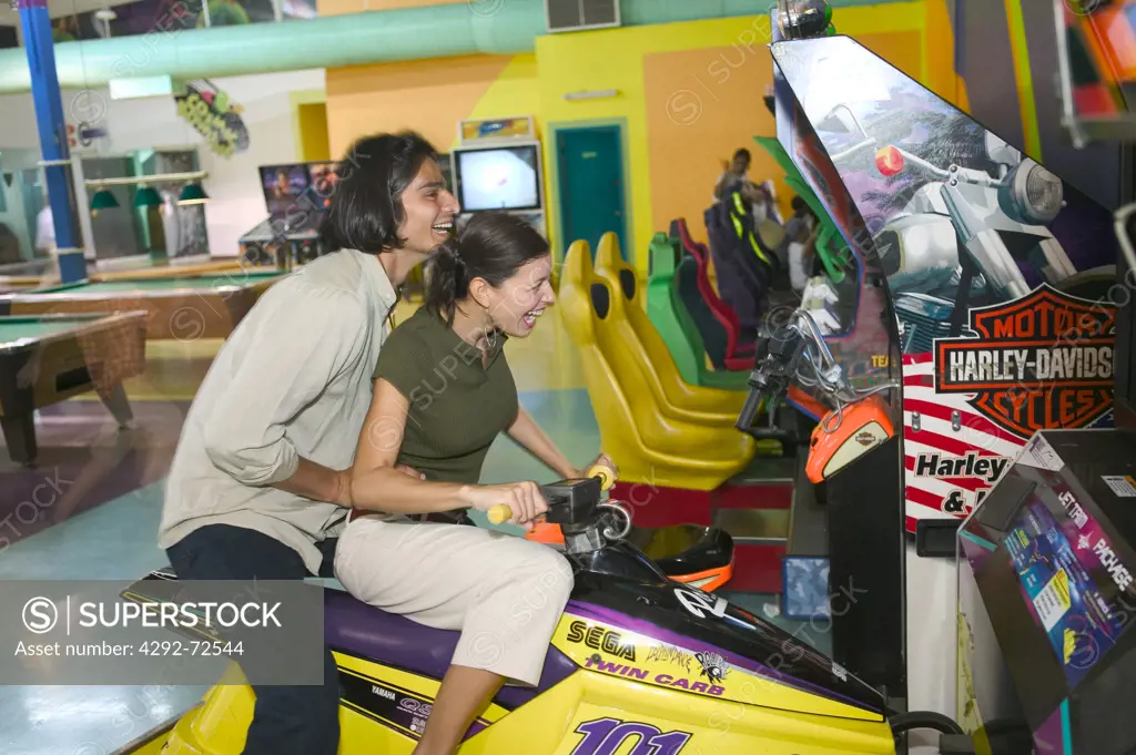 Couple playing arcade games