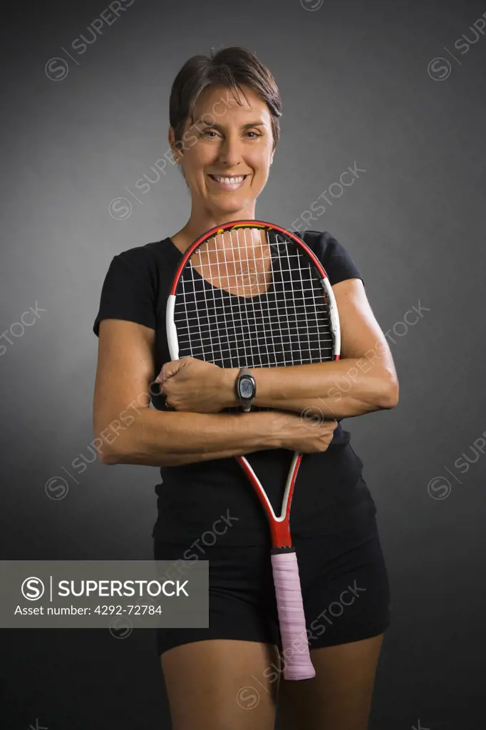 Woman's potrait with tennis racket