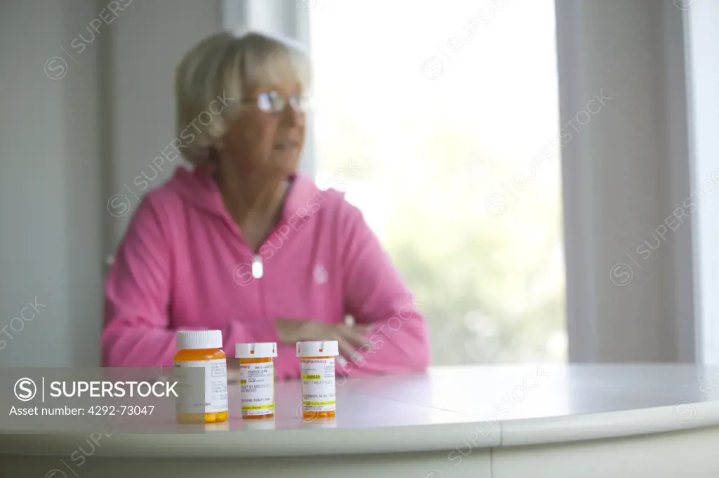 Senior woman with prescription drugs