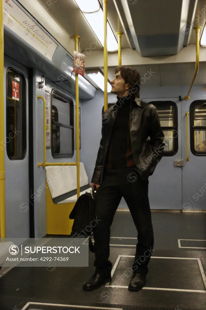 Man standing in subway