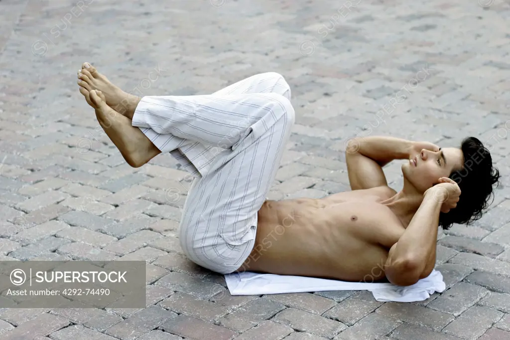 Man exercising abdominal muscles