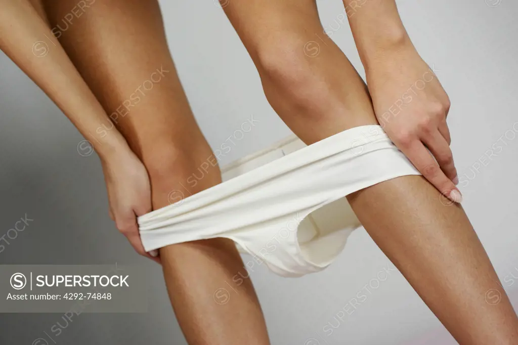 Woman undressing