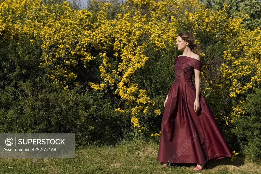 Woman in a park wearing elegant dress
