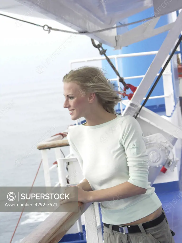 Young woman on cruise ship deck