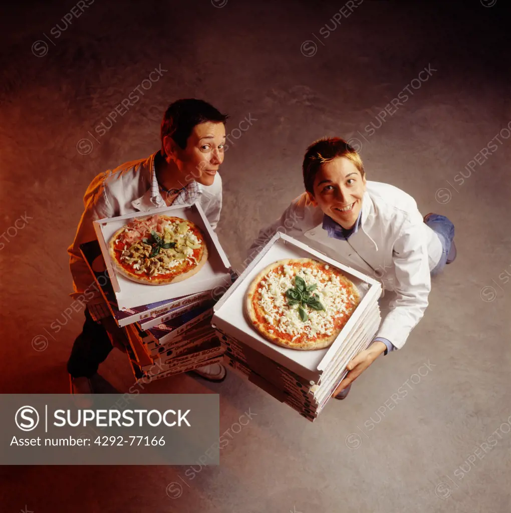 Men with pizza boxes