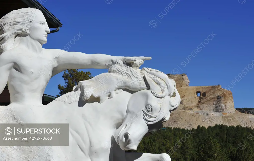 USA, South Dakota, Crazy Horse Memorial, Model of Crazy Horse Sculpture with the Uncompleted Sculpture