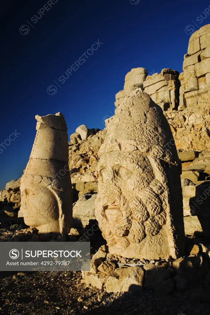 Turkey, Mount Nemrut Dagi, East terrace at sunrise, the colossal heads are, from L-R, Apollon-Helios and Heracles-Artagnes