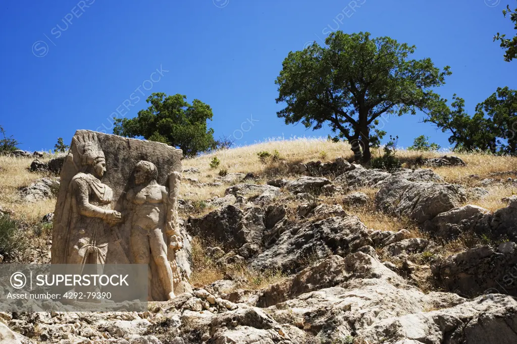 Turkey, archeological site of Arsameia-on-the-nymphaios, stone reliefs of Hercules shaking hands with Antiochus I